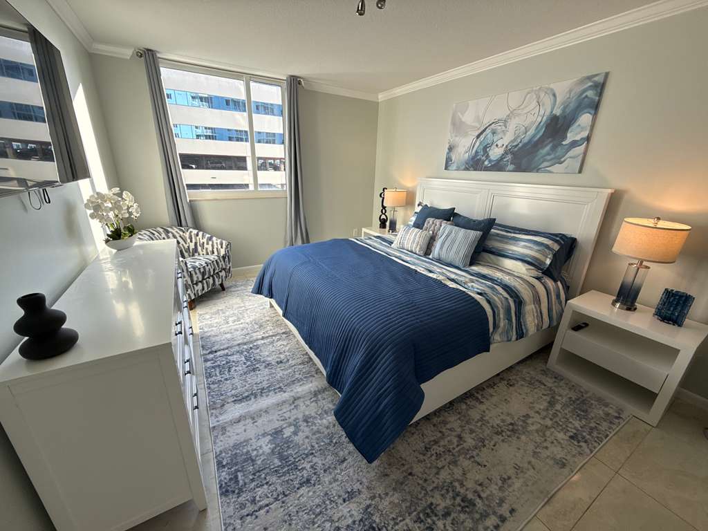 Bedroom after professional interior design and rental property styling