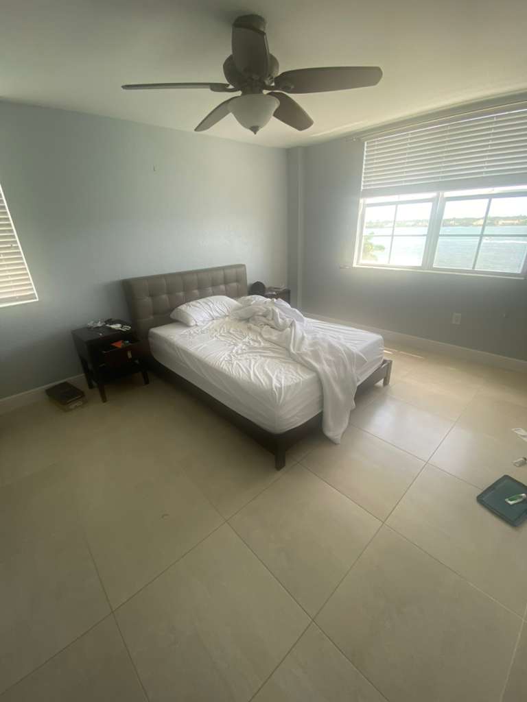 Bedroom before rental property styling transformation