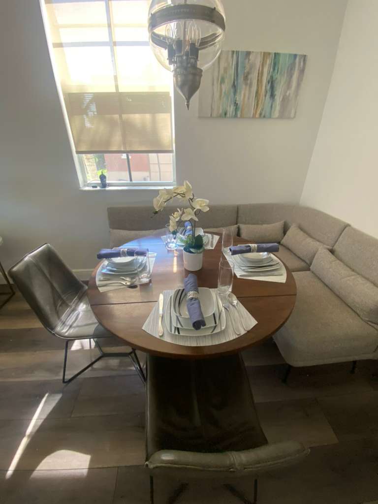 Beautifully styled dining area interior design by Furnish Your Rental