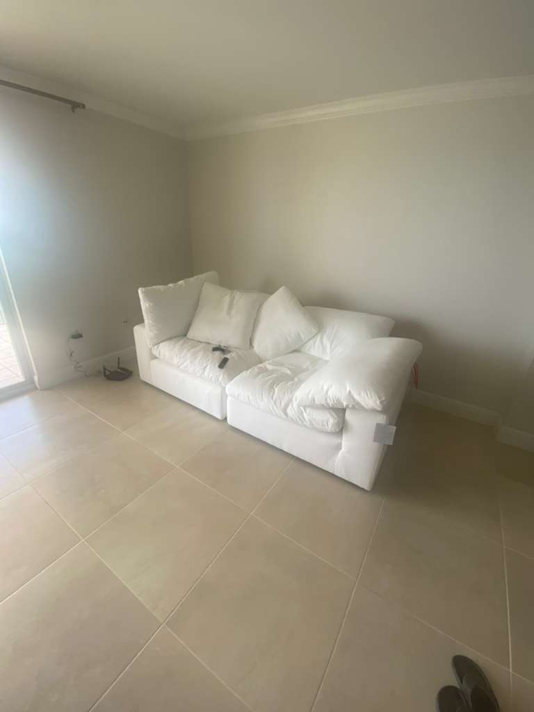 Living room before rental property styling transformation